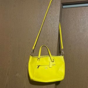 Coach purse gently used. Yellow in color perfect for summer.